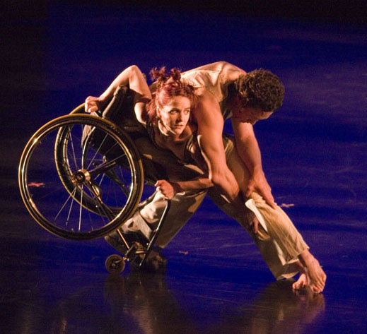 Photo of AXIS Dancers, one in wheelchair