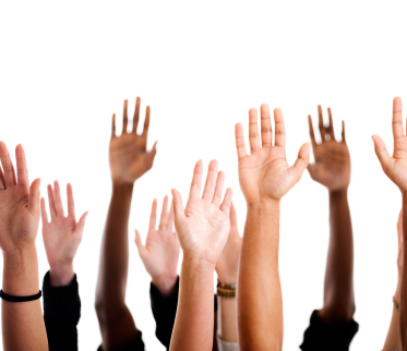 photo of hands up (voting)