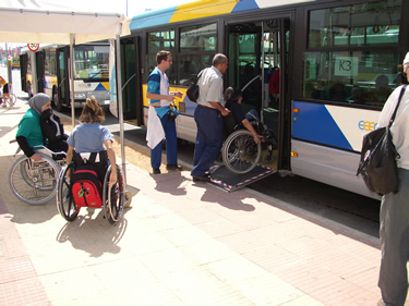 Wheelchair user enter bus at Athens Paralympic Games 2004