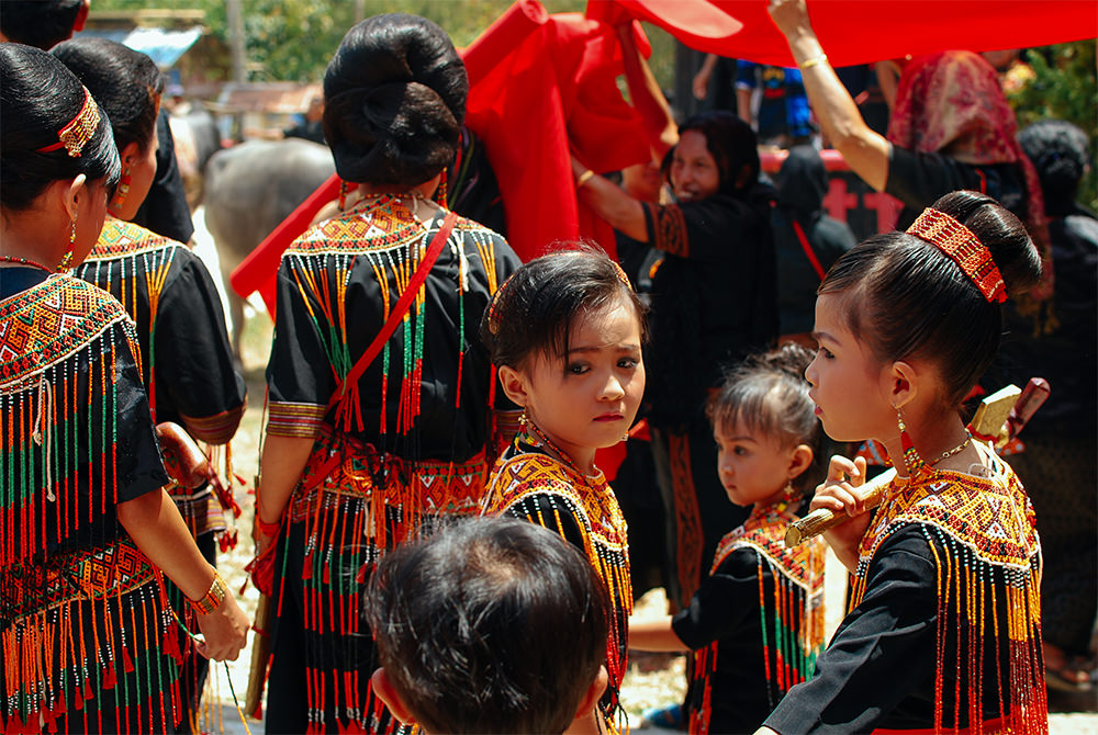 Toraja kids in traditional dress, Sulawesi (Accessible Indonesia)