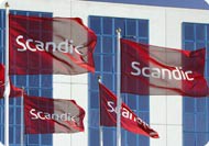 Photo showing Scandic flags flying in front of hotel