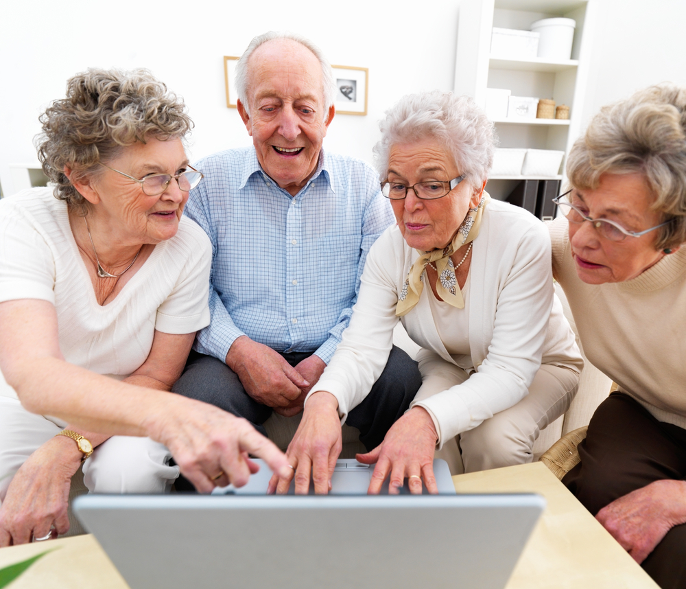 image of older people viewing laptop