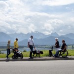 Image of pedestrians strolling along a footpath in Tyrol.