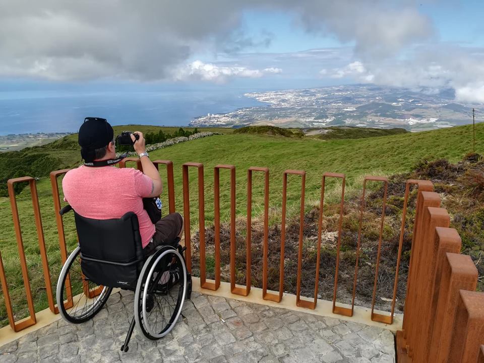 Wheelchair user taking panorama photo Azores for All
