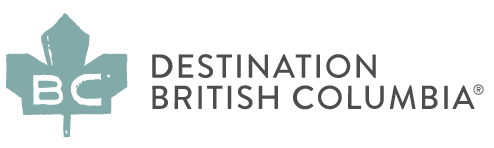 Destaination British Columbia logo with green maple leaf  