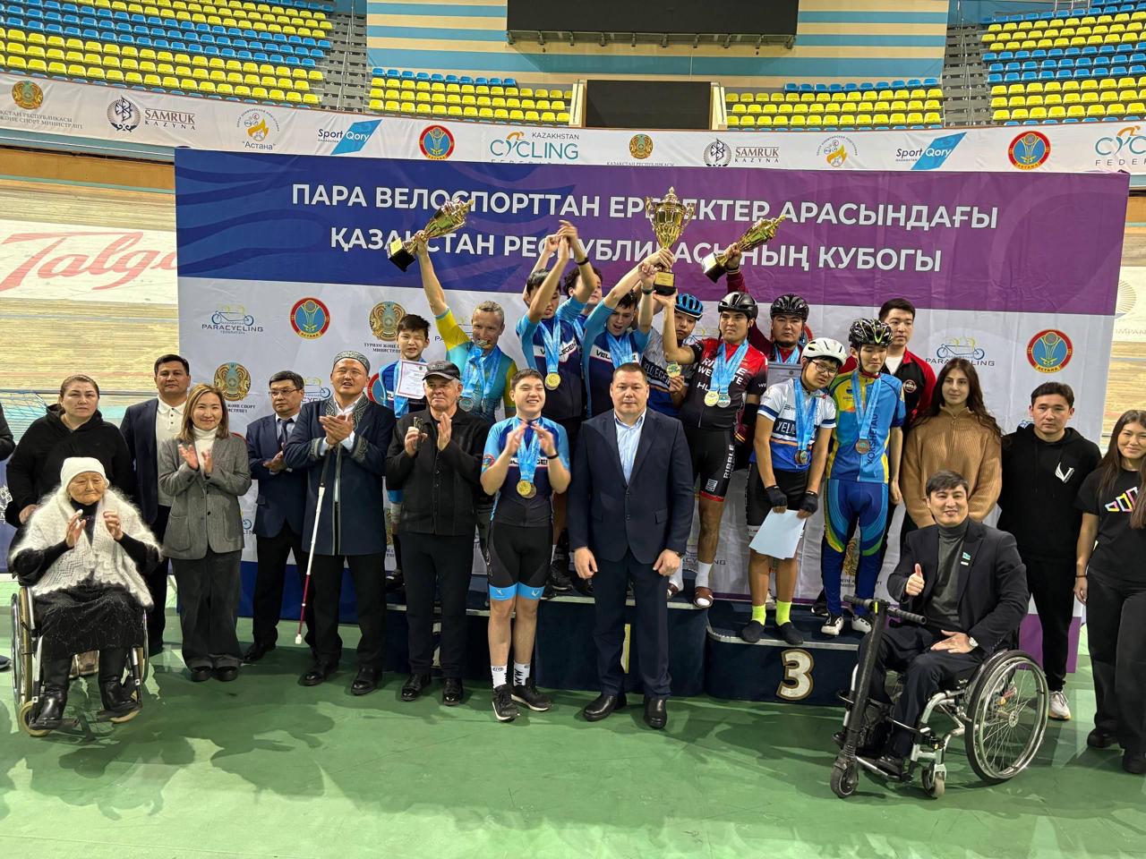 Astana velodrome with paracycling team celebration