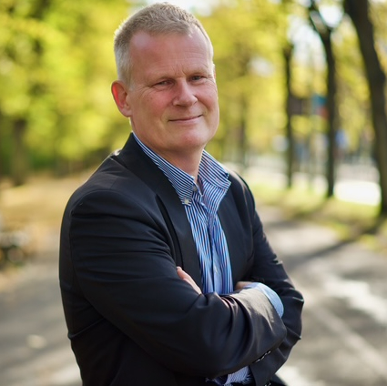 Photo of Magnus Berglund, facing the camera and smiling 